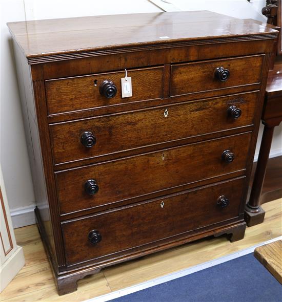 A George III oak chest of drawers, W.98cm